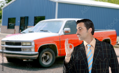 car used salesperson selling old car as brand new