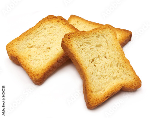 Toasted loaves over white background