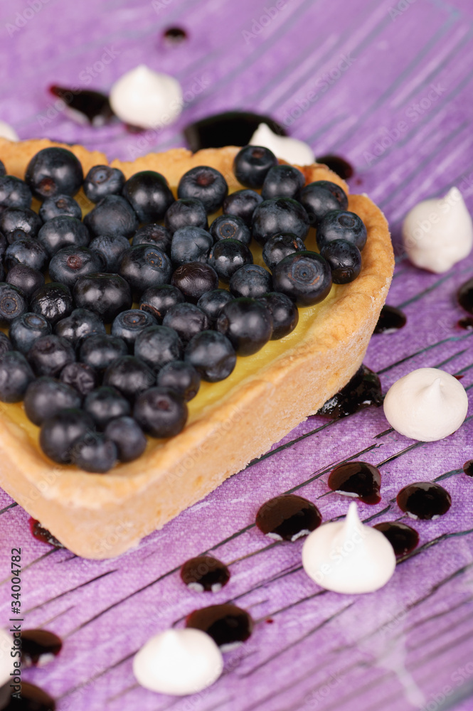 Heart-shaped tart with blueberry