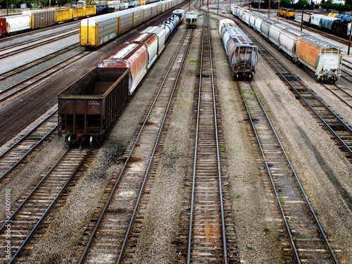 View of many railroad tracks with cars