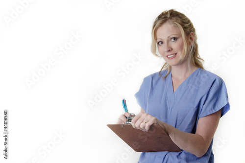 Friendly nurse holding chart