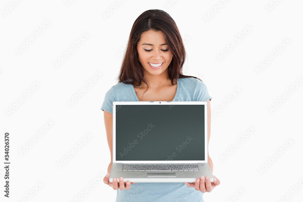 Attractive woman posing with her laptop Attractive woman posing with her laptop