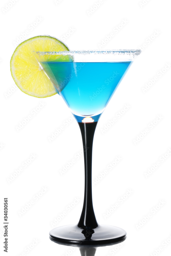 Blue cocktail with  lime isolated on white