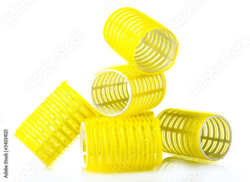 yellow curlers isolated on white