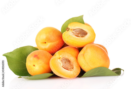 apricots with leaves isolated on white