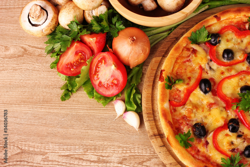 pizza and vegetables on a red background pizza and vegetables on a red background