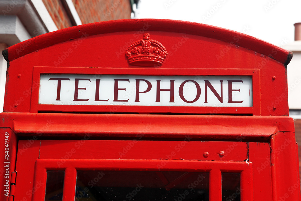 Traditional red telephone box in London, UK Traditional red telephone box in London, UK