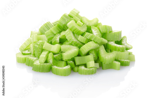 Celery pieces heap isolated on white, clipping path included