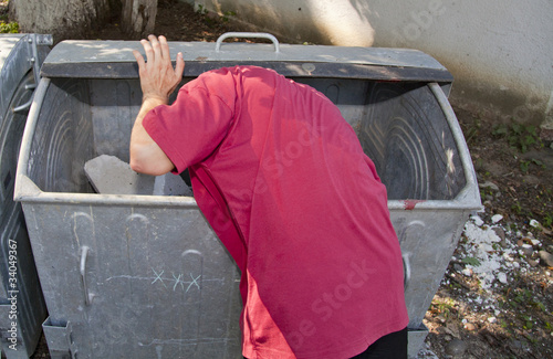 young man in dumpster