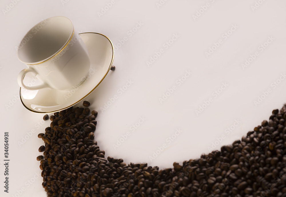 Fototapeta premium Ziarna kawy z filiżanką