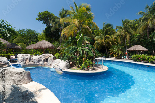 Tropical swimming pool side in Mexico