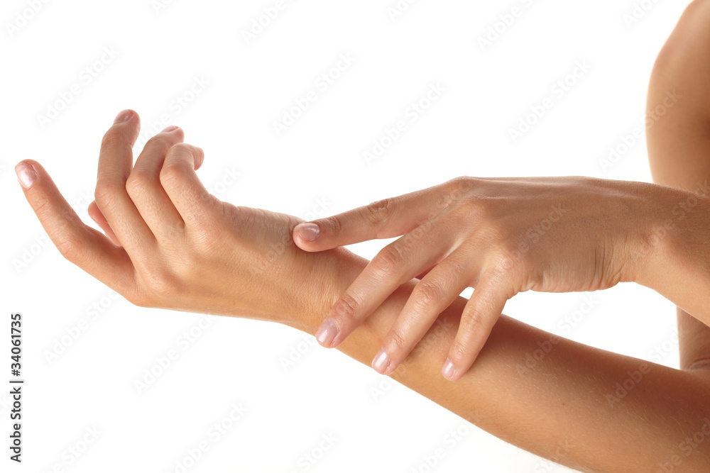 female applying cream to her hands