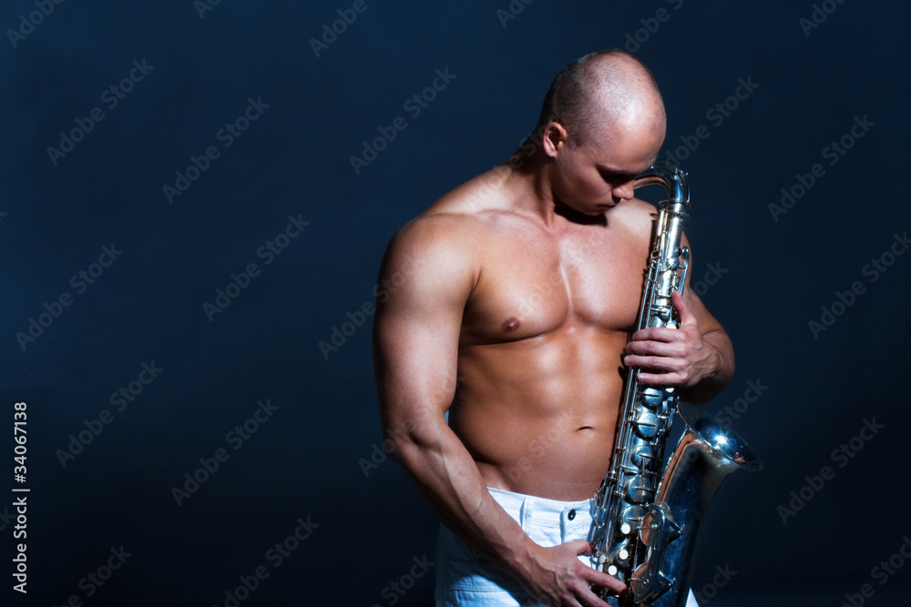 Naklejka premium Man playing sax