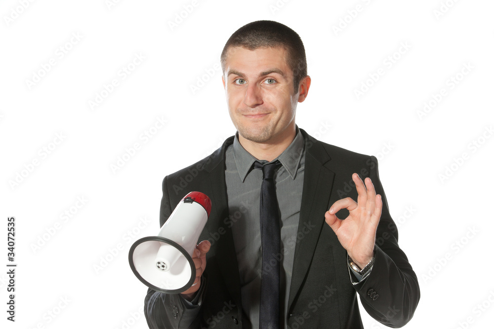 Portrait of a young business man having good news Portrait of a young business man having good news