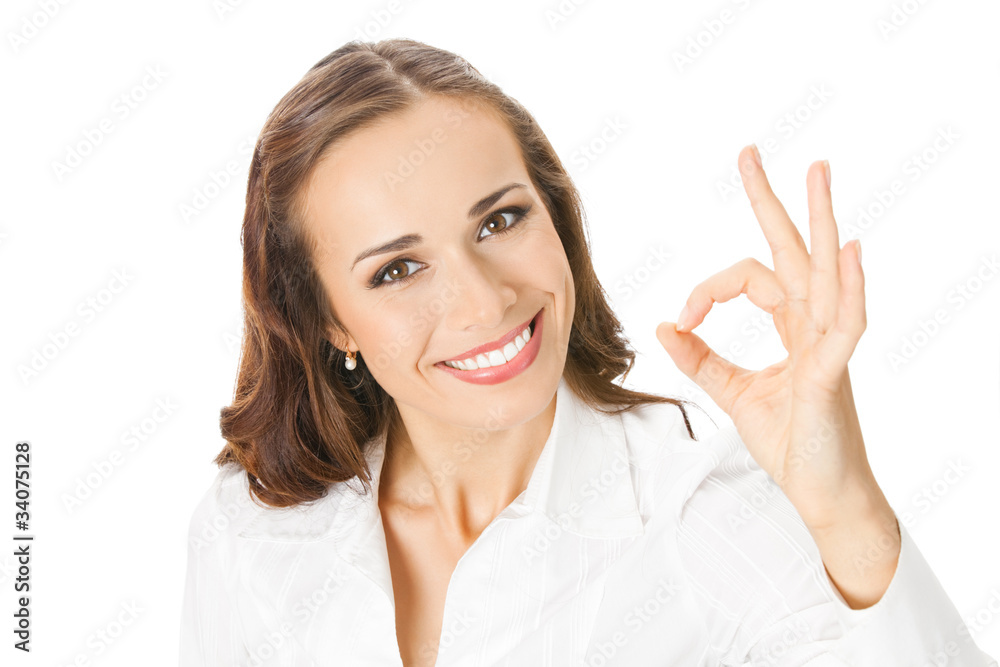 Happy smiling business woman with okay gesture, isolated Happy smiling business woman with okay gesture, isolated
