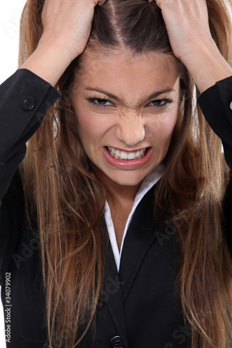 Foto Businesswoman pulling hair out