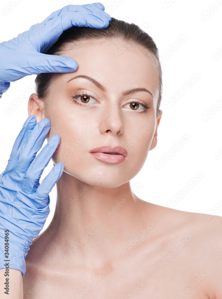 Beautician touch and exam health woman face Beautician touch and exam health woman face