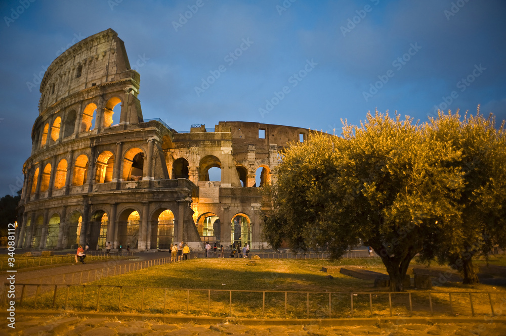 Colosseum in Rome , Italy at twilight