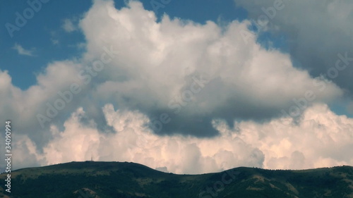 Clouds swirl over the mountains