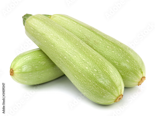 Fresh vegetable marrow. Isolated on white photo