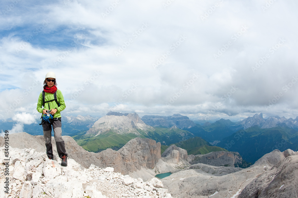Mountain scenery with rock climber. Dolomites, Italy.