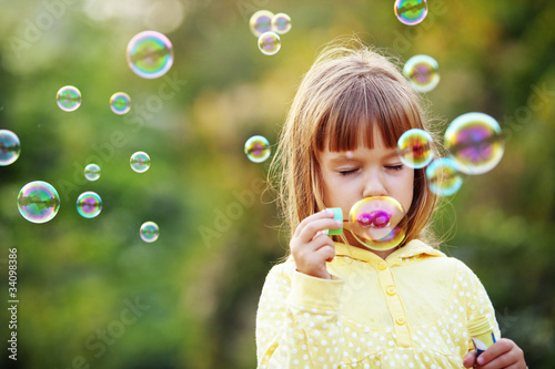 Child starting soap bubbles