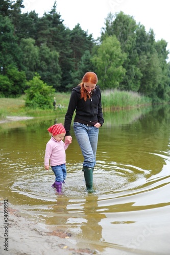 mother, baby, walk in a water
