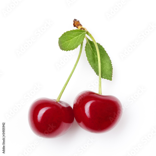 Red cherry with leaves on white