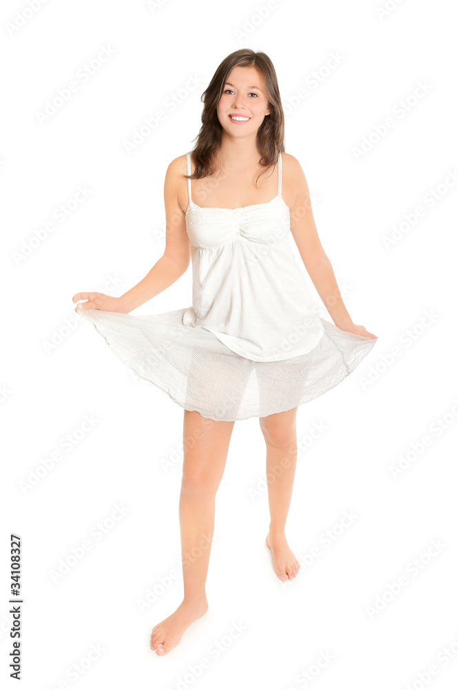 Naklejka premium Schöne junge Frau spielt mit ihrem Rock