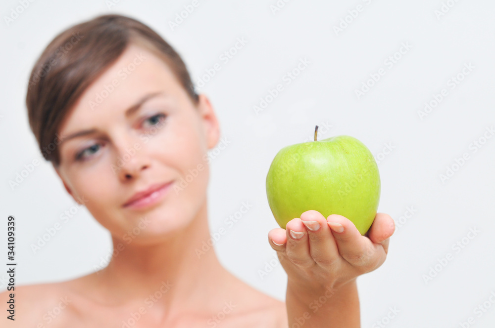 Beautiful woman with green apple in hand Beautiful woman with green apple in hand