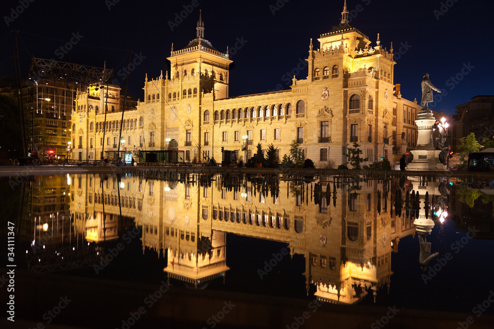 Great building and Jose Zorrilla statue at night. Valladolid
