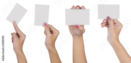 female hand holding a business card