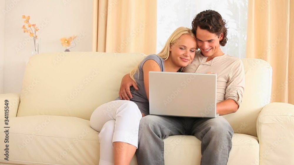 Young couple surfing the web together Young couple surfing the web together