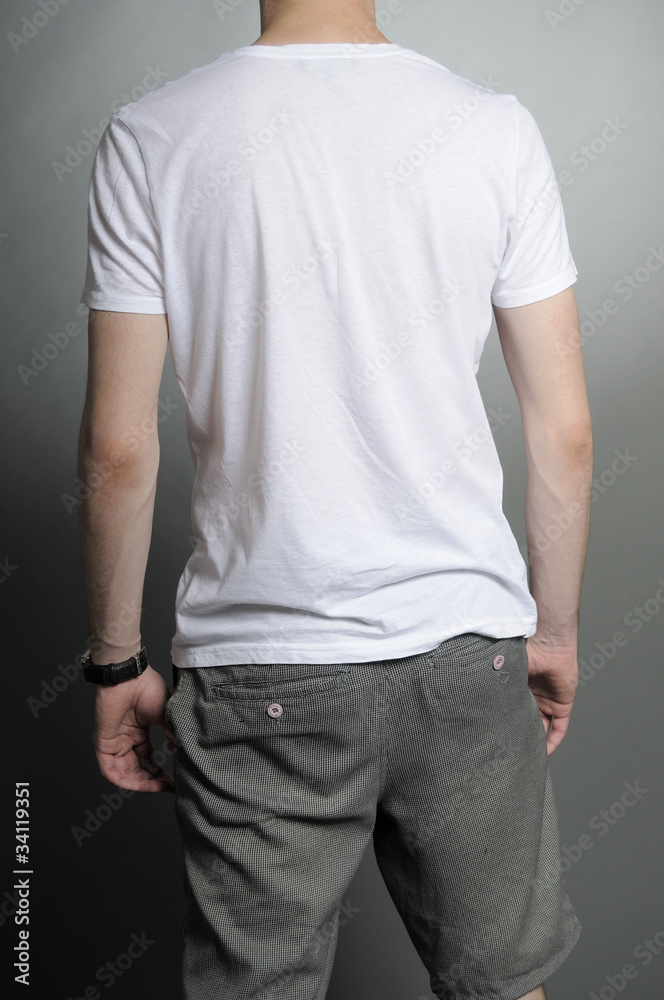 Obraz premium back of young man posing in studio