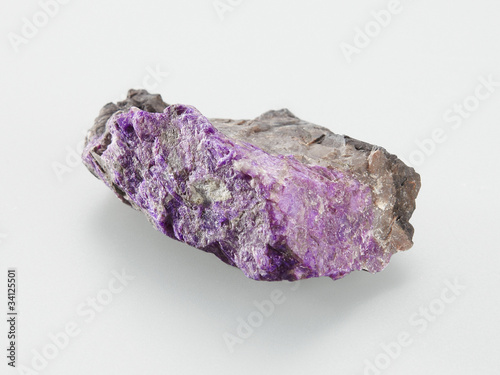 Mineral Sugilit on grey background