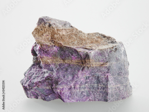 Mineral Sugilit on grey background