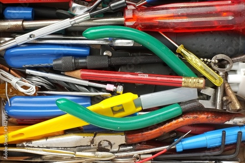 A collection of hand tools for electrical or electronic jobs.
