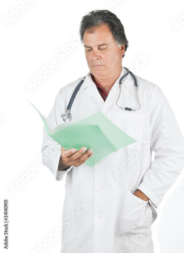 Doctor reading patient file