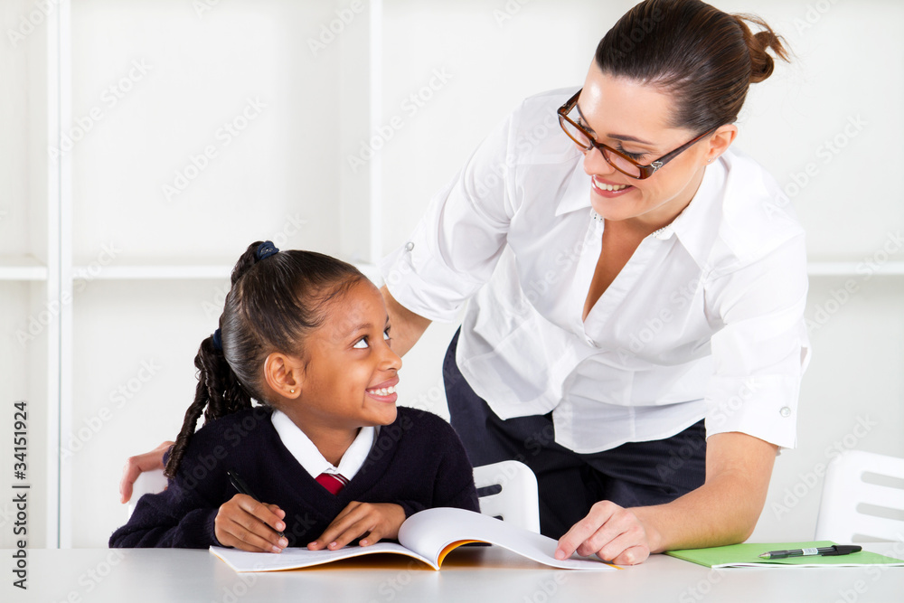 Obraz premium teacher and primary student