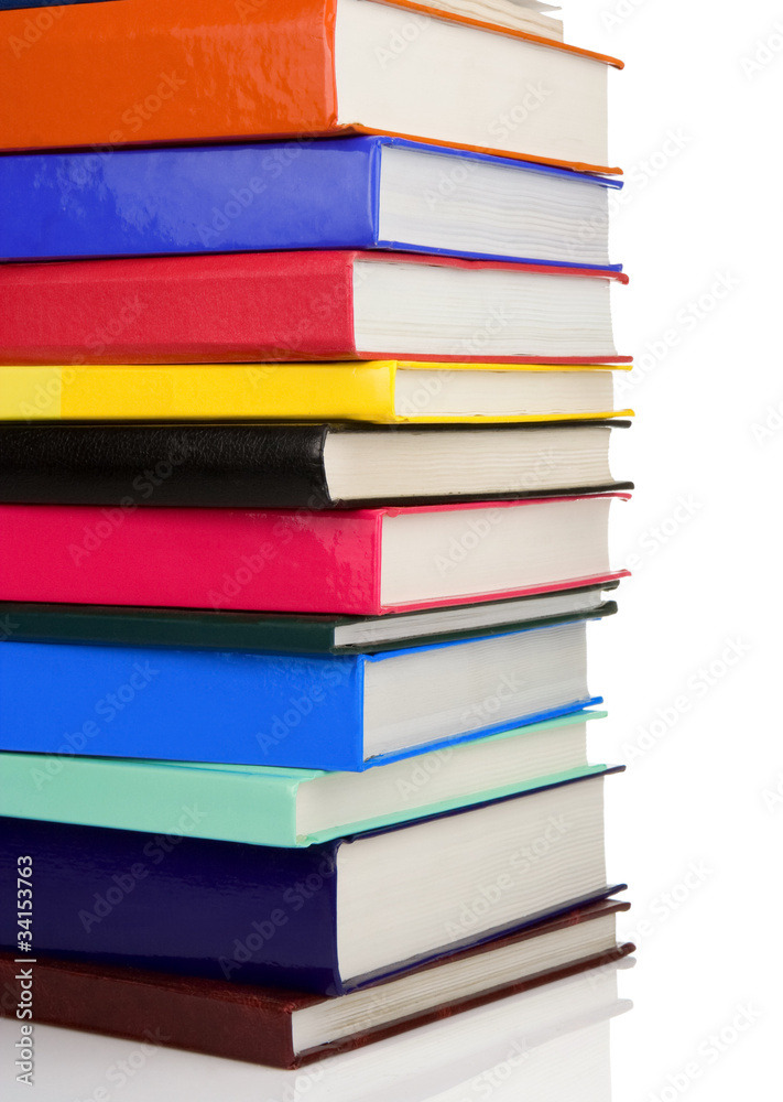 pile of new books isolated on white pile of new books isolated on white