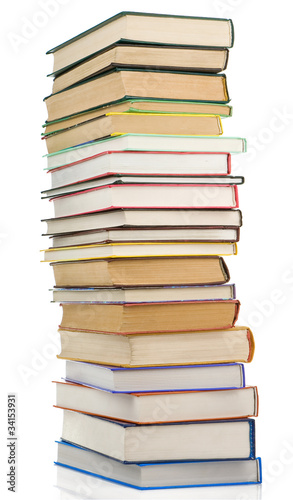 pile of new books isolated on white