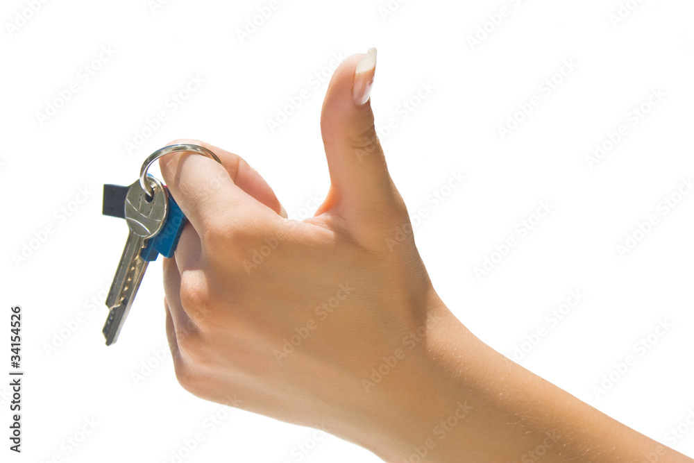 Hand holding keys showing thumb up Hand holding keys showing thumb up