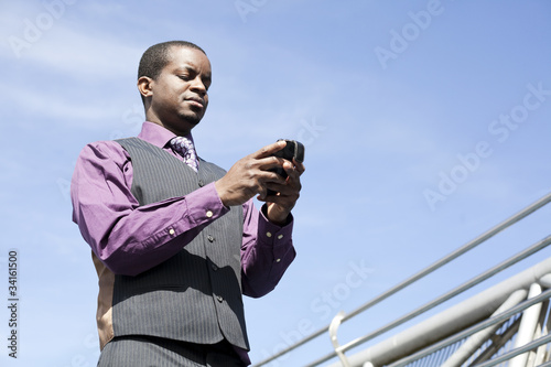 Black business man working with smart phone