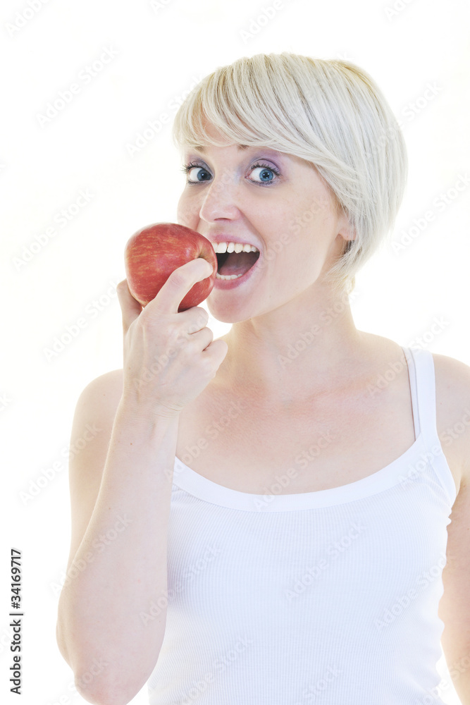 happy young woman eat green apple isolated on white happy young woman eat green apple isolated on white