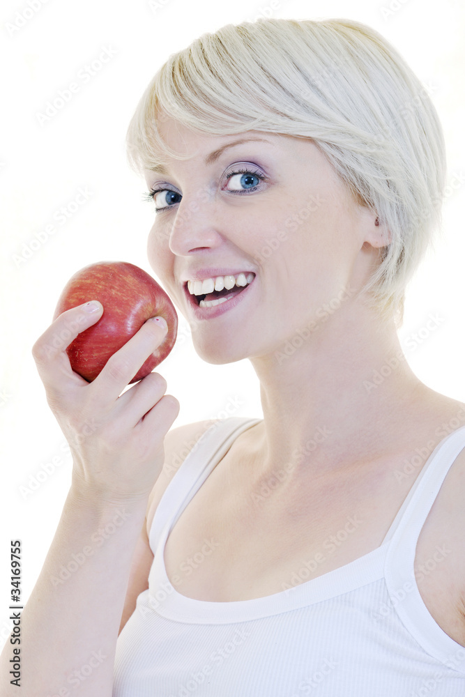 happy young woman eat green apple isolated on white happy young woman eat green apple isolated on white