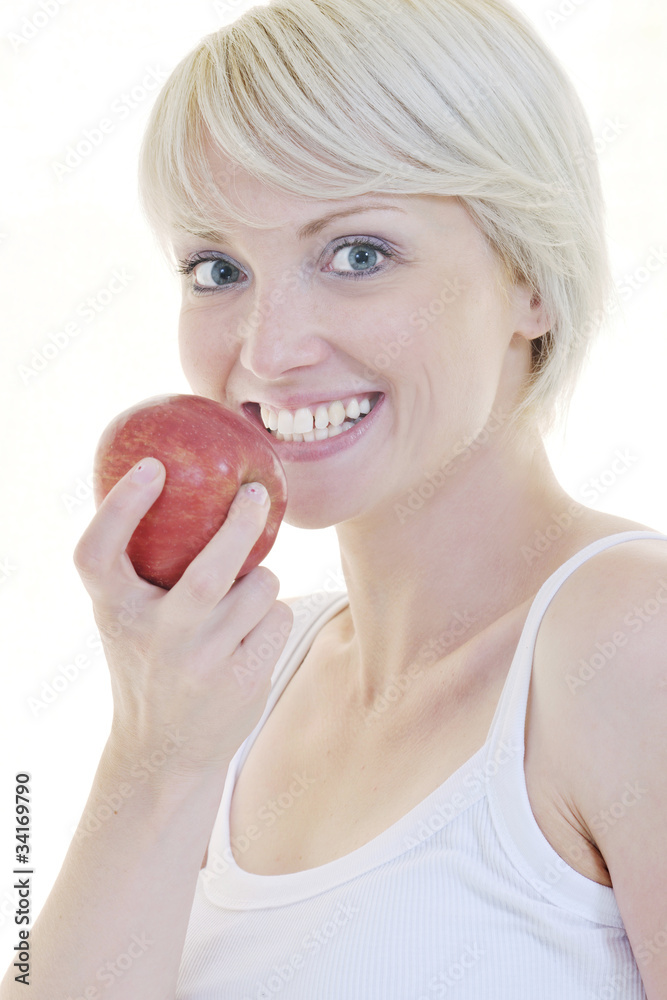happy young woman eat green apple isolated on white happy young woman eat green apple isolated on white