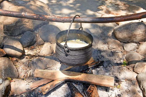 фотографія Wampanoag indians traditional dinner on the firepit.