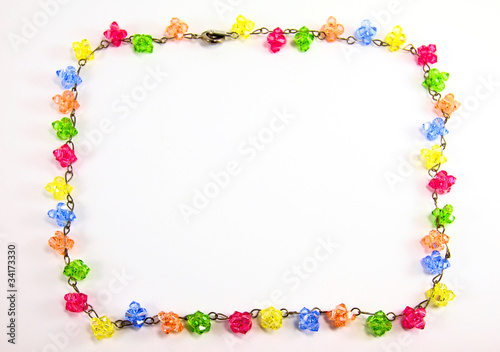 colorful necklace crystal frame on white background © Nuchylee
