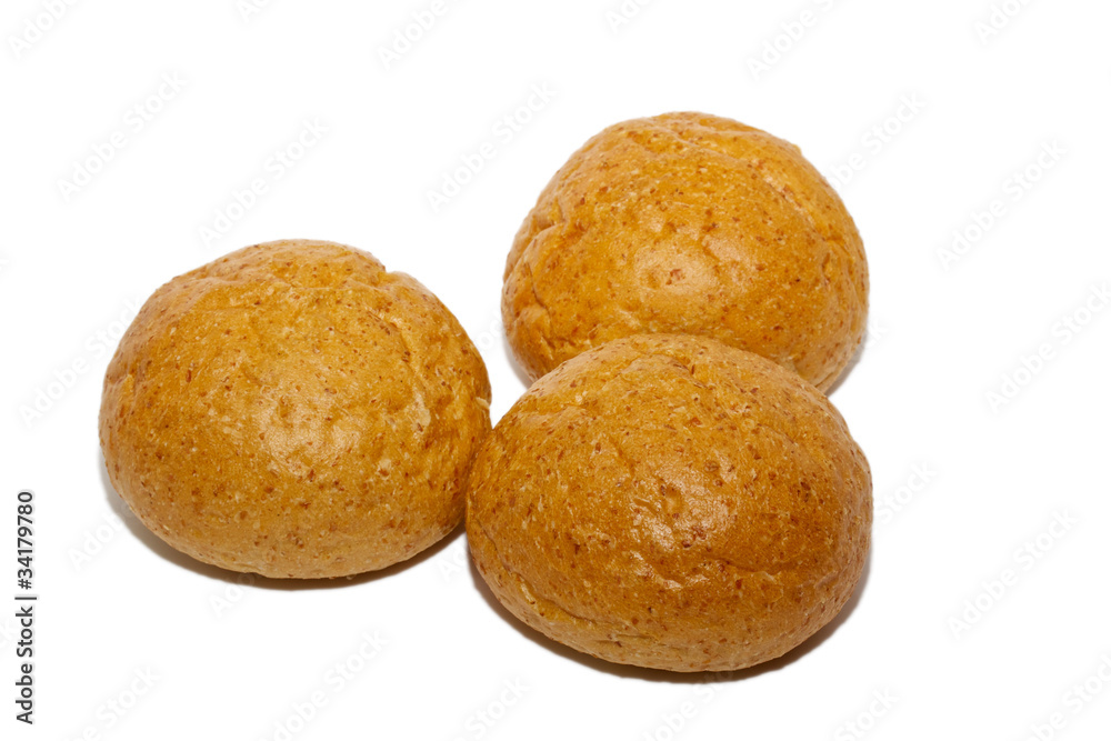 Loaf of bread and rolls isolated on white Loaf of bread and rolls isolated on white