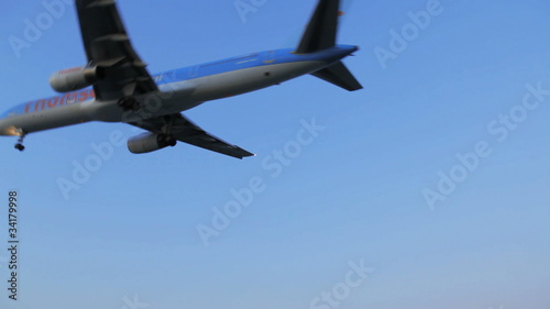 Landing of airplane, sunset scene, Corfu airport, Greece